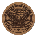 Cork coaster with an eagle design celebrating the 250th anniversary of the USA on a white background.