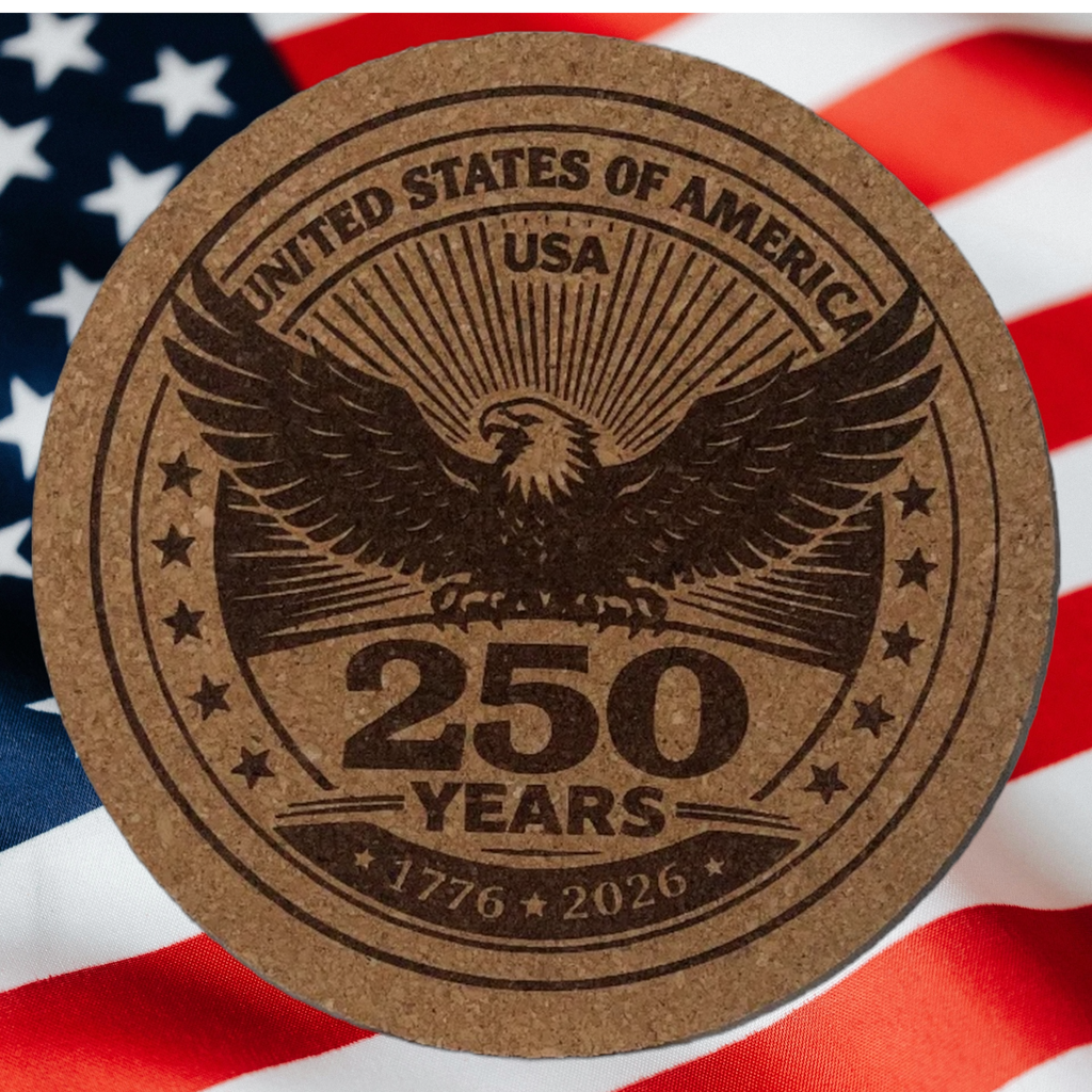 Round cork coaster with an eagle design and 'United States of America 250 Years' text on an American flag background.