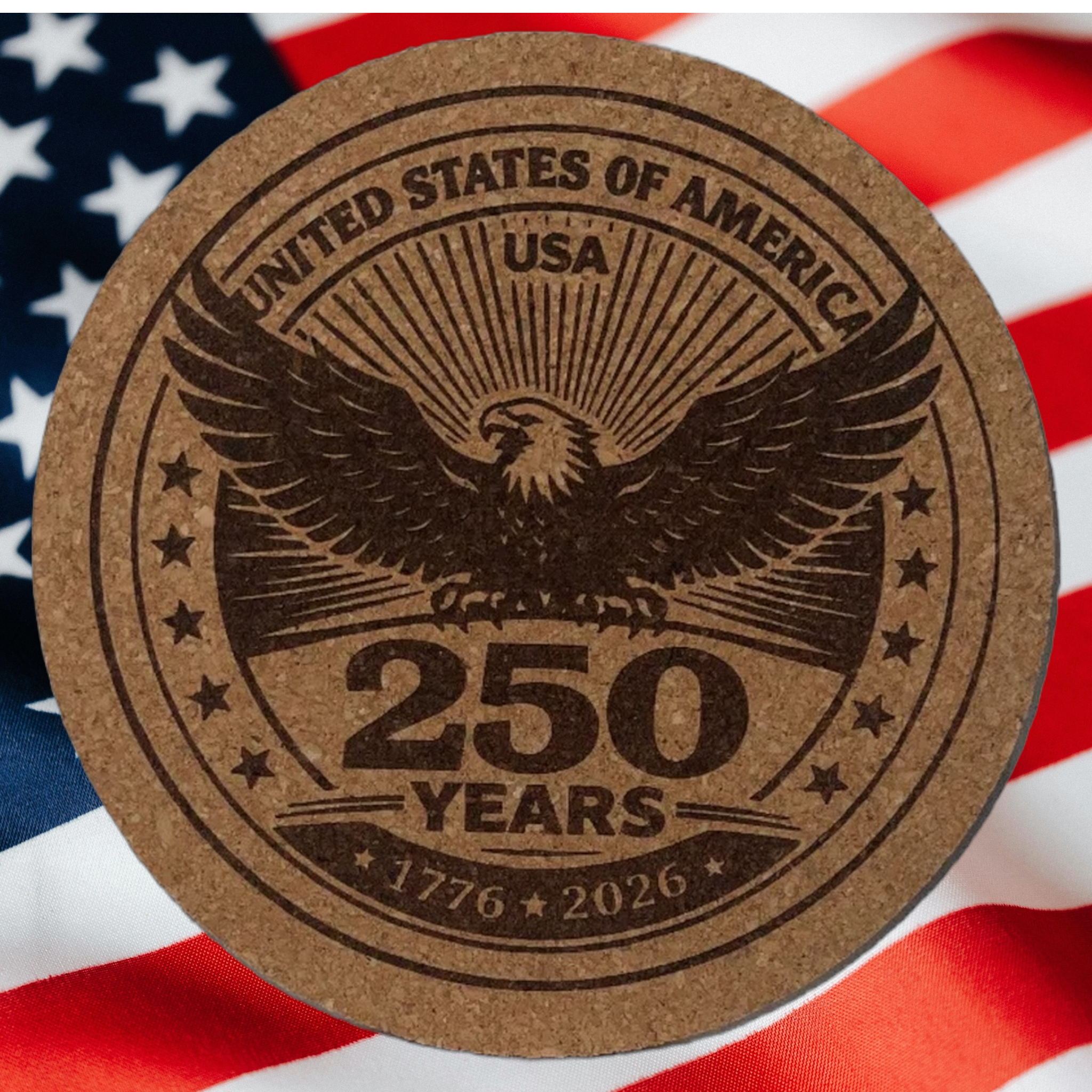 Round cork coaster with an eagle design and 'United States of America 250 Years' text on an American flag background.