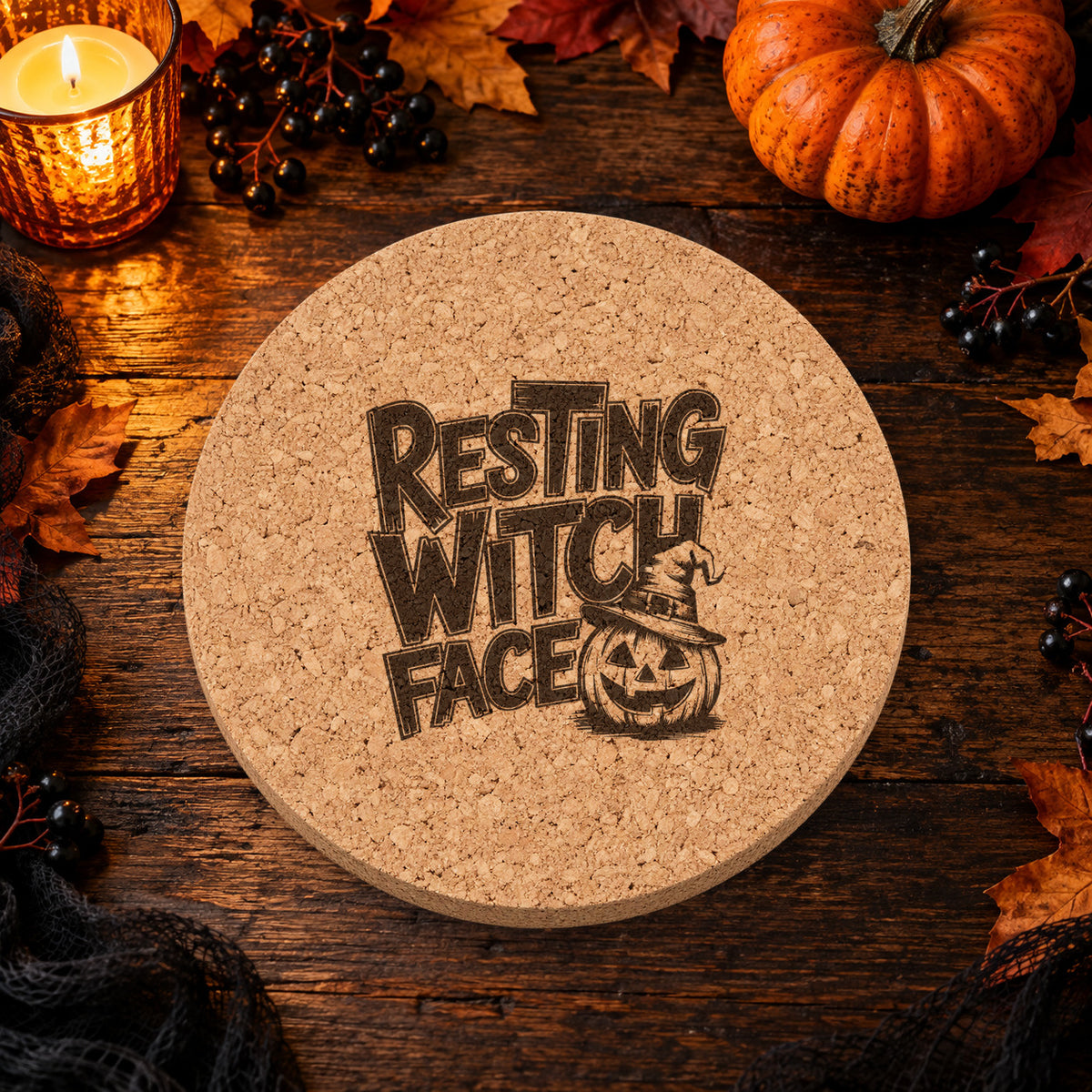 Resting Witch Face laser engraved Halloween cork coaster — lifestyle view